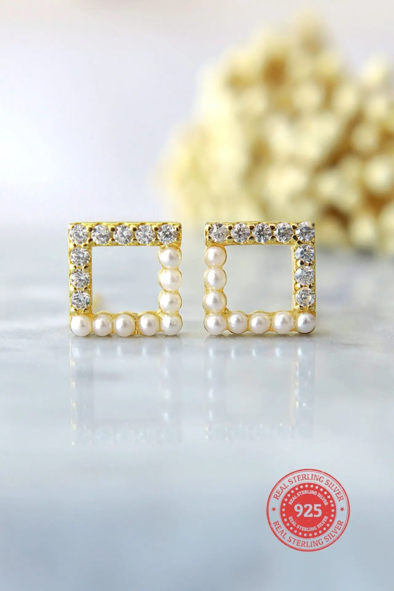 24 karat gold stud earrings