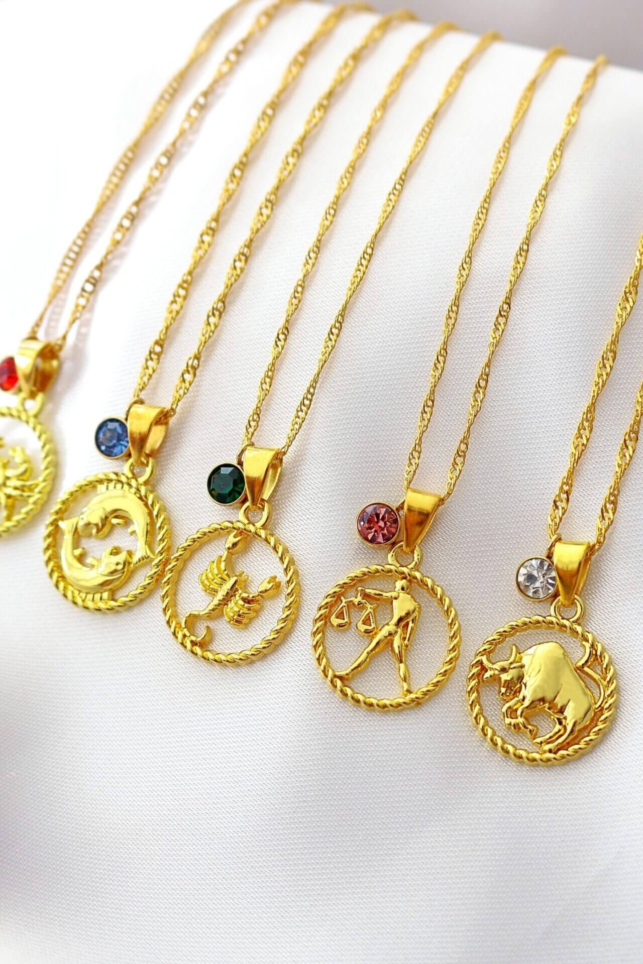 18 karat gold zodiac necklace