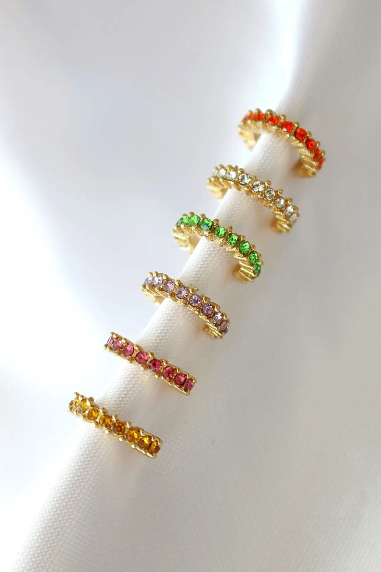 18 karat rainbow ear cuffs