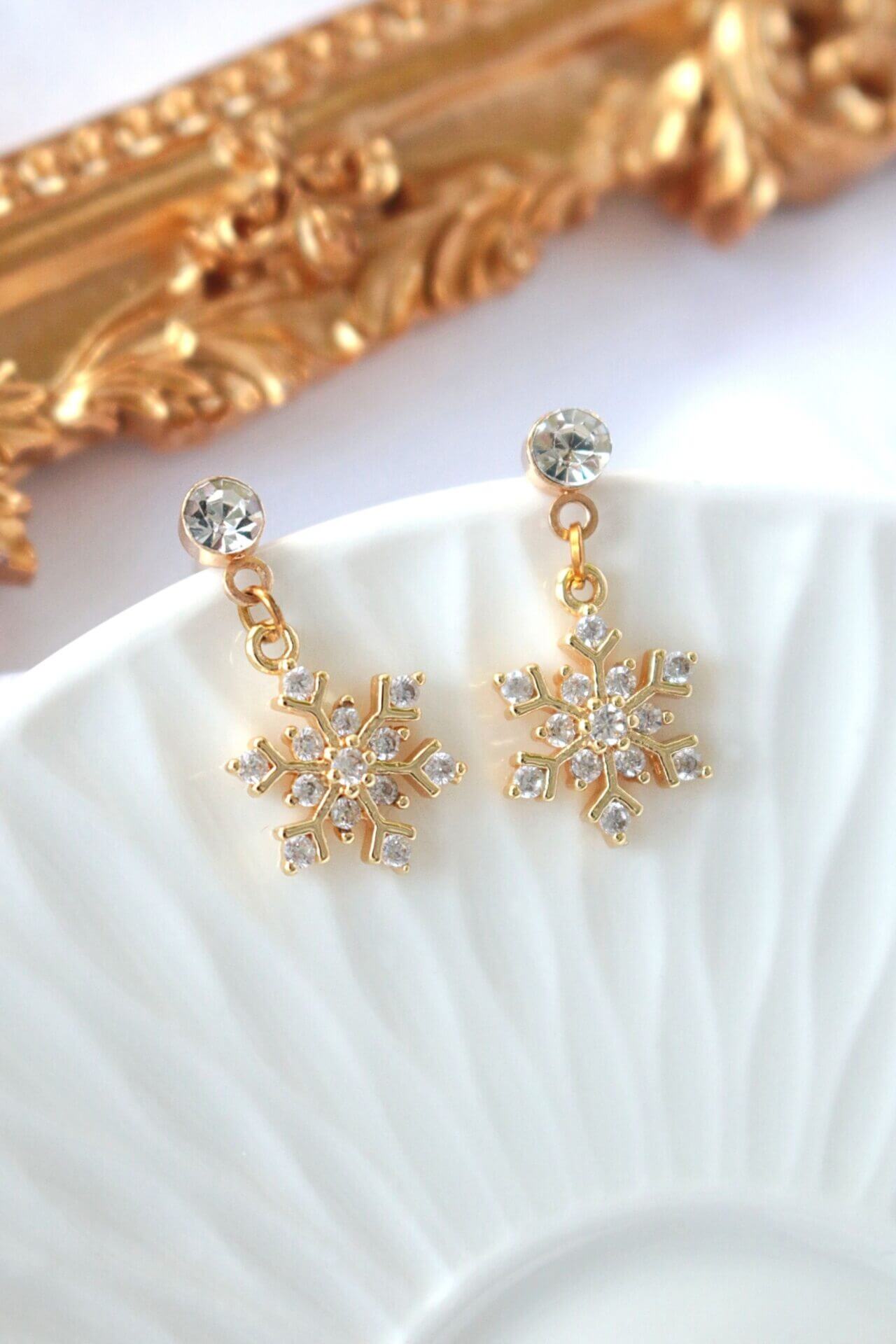 24 karat gold snowflake earrings